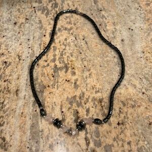 Hematite woman's necklace with light pink and black beads at the top of necklace